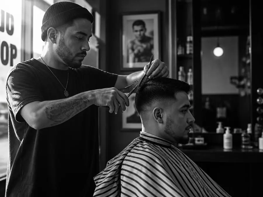Adcenter client barbershop serving customers